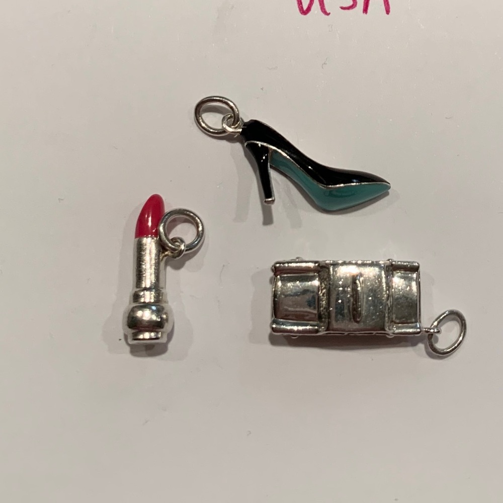 Hard to find Tiffany co charm set
